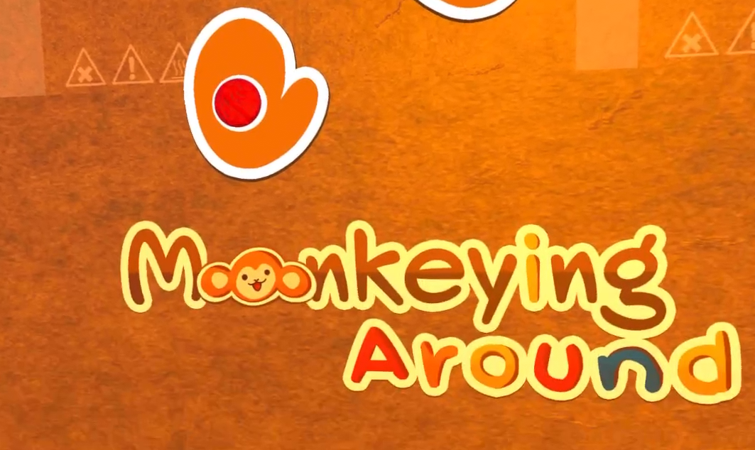 Colorful title Monkeying Around and a monkey paw.